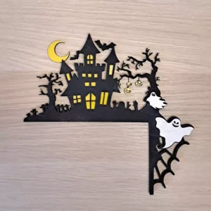 Halloweenowy knarożnik z zamczyskiem i duchami