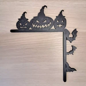 Halloweenowy narożnik z dyniami i nietoperzami